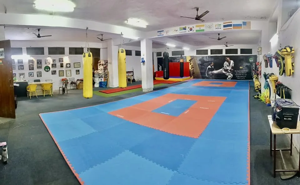 Blue and orange training mats inside the GOSEDMA academy